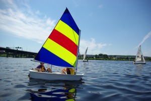 Youth sailing on the river